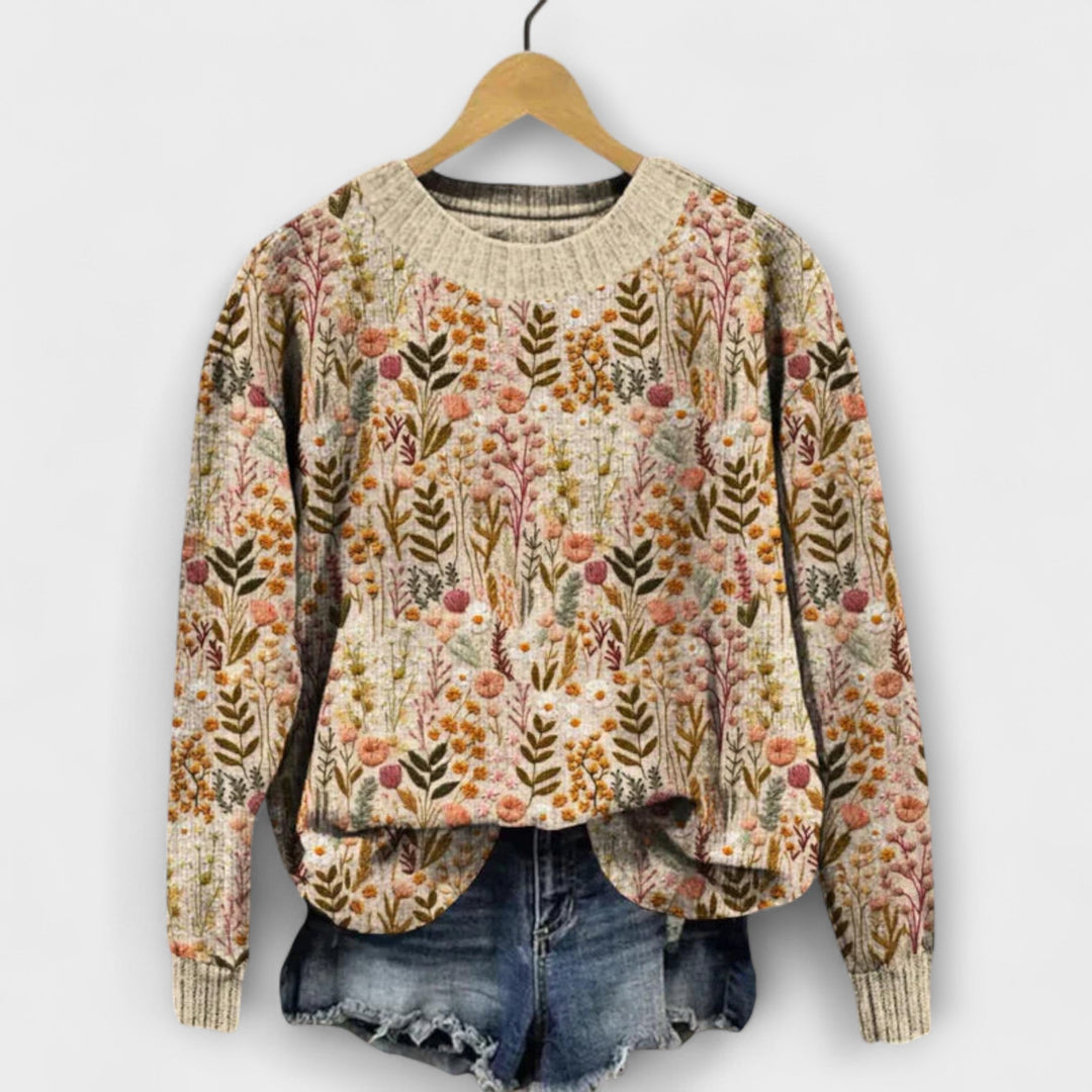 Tina - Beige trui met bloemenpatroon