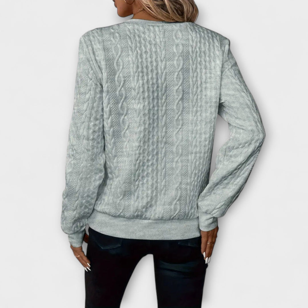Joy - Elegante witte trui met reliëfpatroon