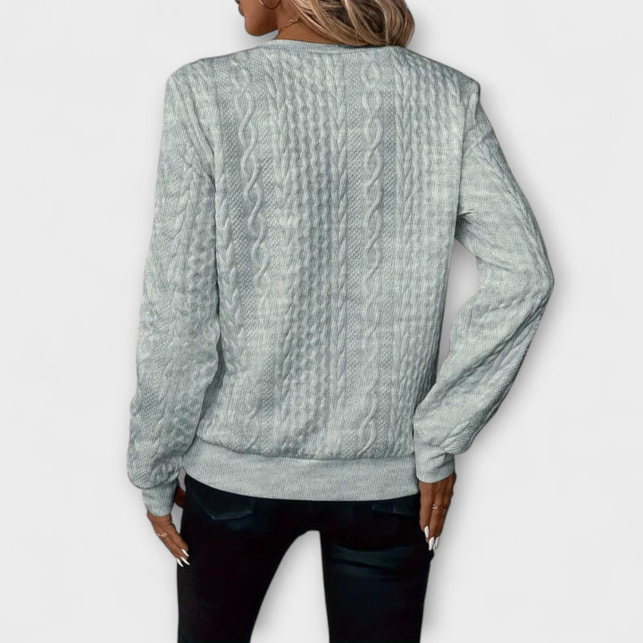Joy - Elegante witte trui met reliëfpatroon