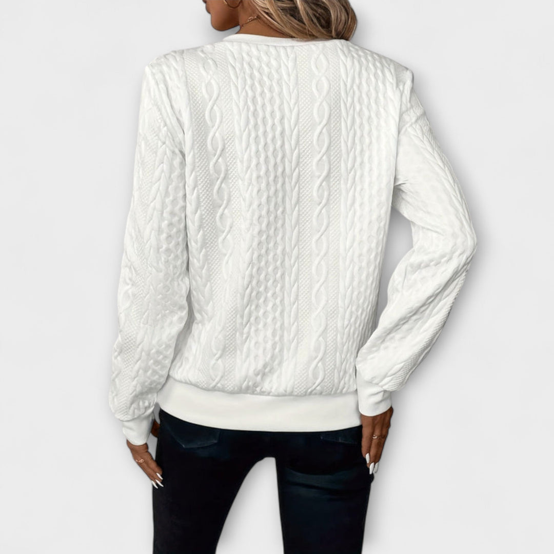 Joy - Elegante witte trui met reliëfpatroon